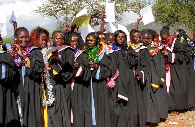 Pokot community girls who escaped from Female Genital Mutilation and forced early marriages parade during their graduation ceremony after completing trainings on social entrepreneurship and information and communications technology (ICT) at the St. Elizabeth girls centre in Ortum, West Pokot county, Kenya, September 15, 2016. (Photo by Reuters/Stringer)
