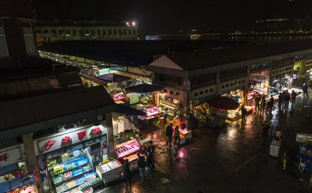 General night view of the Huangsha Seafood Market in Guangzhou, Guandong Province, China, 20 January 2018. (Photo by Aleksandar Plavevski/EPA/EFE)