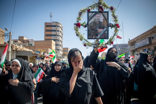 Mourners attend a funeral for those killed in Israeli strikes on Iran, in Ahvaz, Iran on June 19, 2025. (Photo by Alireza Mohammadi/ISNA/WANA (West Asia News Agency) via Reuters)