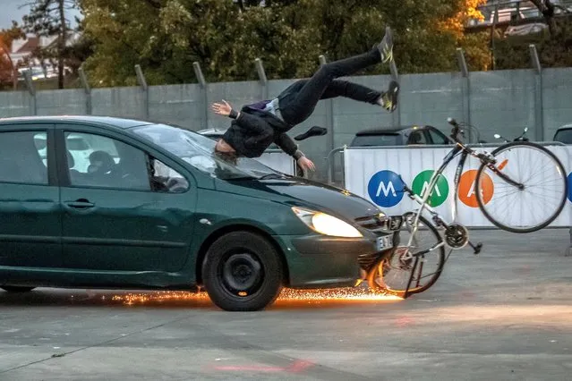 A car collides with a mannequin on an bike during a crash test in Paris on October 23, 2020. (Photo by Bertrand Guay/AFP Photo)