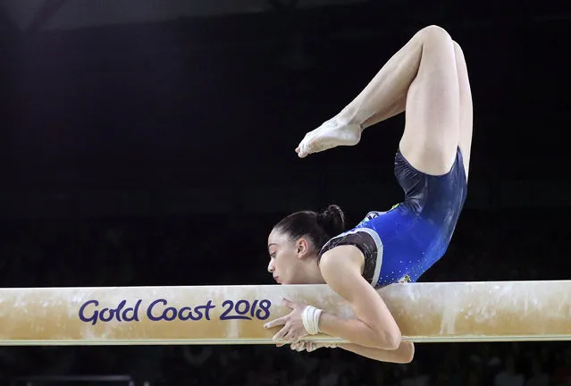 Cyprus' Gloria Philassides competes on the balance beam during the women' s team final and individual qualification in the artistic gymnastics event during the 2018 Gold Coast Commonwealth Games at the Coomera Indoor Sports Centre in Gold coast in Gold Coast on April 6, 2018. (Photo by Athit Perawongmetha/Reuters)