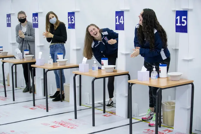 Students get a Covid-19 test at a mass testing centre set up at the sports centre at St Andrews University, United Kingdom on November 27, 2020, ahead of the Christmas holiday. (Photo by Jane Barlow/PA Images via Getty Images)