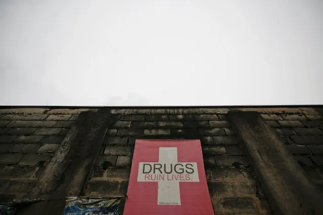 An anti-drug banner is displayed on a wall in Manila, Philippines October 15, 2016. (Photo by Damir Sagolj/Reuters)