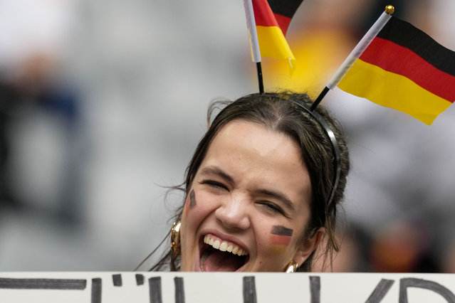 A German fan cheers prior to the Group A match between Germany and Scotland at the Euro 2024 soccer tournament in Munich, Germany, Friday, June 14, 2024. (Photo by Antonio Calanni/AP Photo)