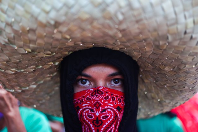 Protesters march during a demonstration against corruption under President Ferdinand Marcos Jr's administration, in Manila, Philippines on October 21, 2025. The demonstration is part of the Southeast Asian country's growing public outrage over exposed corruption in nationwide flood-control infrastructure projects worth of more than 9 billion U.S. dollars under Ferdinand Marcos Jr's administration, with young people as the majority staging protests with One Piece flags, joining a global trend of anti-government protests led by Gen-Z including those in Nepal and Indonesia. (Photo by Daniel Ceng/Anadolu via Getty Images)