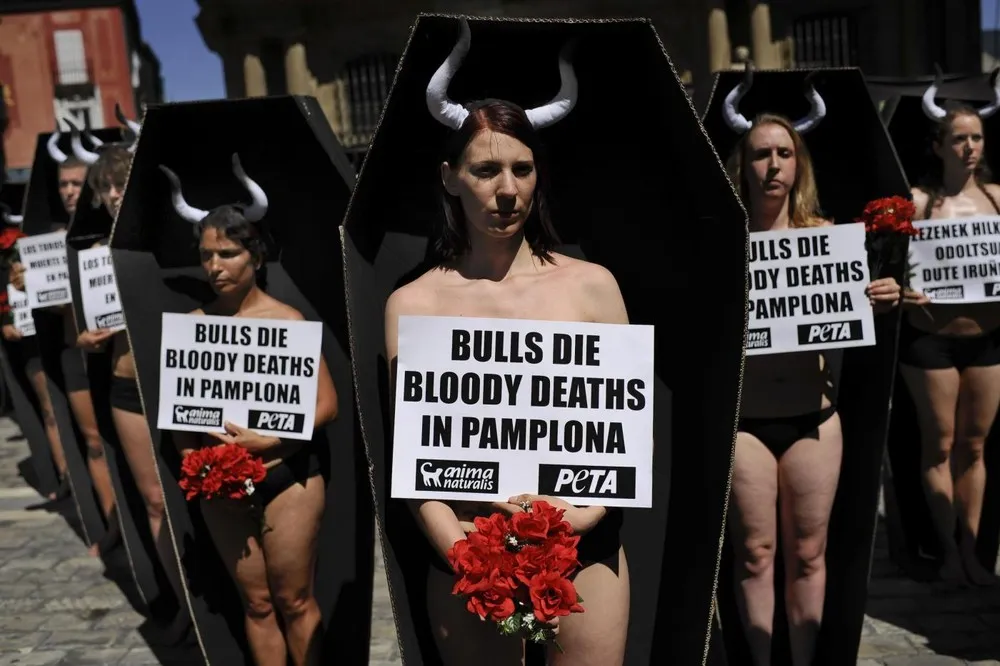 Naked “Corpses” Bare the Bloody Cruelty of Bullfighting in Pamplona