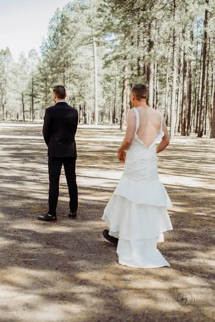 Groom Val Zherelyev was waiting to meet his bride Heidi when he was surprised by his soon to be brother-in-law Eric Dodds in Arizona on July 18, 2018. A groom expecting to see his bride for the first time on their wedding day was puzzled when he laid eyes upon his prankster brother-in-law donning a white dress of his own. Val Zherelyev, 26, was waiting for his bride Heidi, 25, to take photos on the morning on the couple’s wedding and was excited when he heard soft footsteps approaching from behind. Val, of Tempe, Arizona, slowly turned around expecting to have an emotional moment with Heidi only to lay eyes on her brother Eric Dodds, 30, instead. Val said: “I was so nervous and anxious but excited to see Heidi”. (Photo by Nichole Cline at Kevin Chole Photography/SWNS.com)