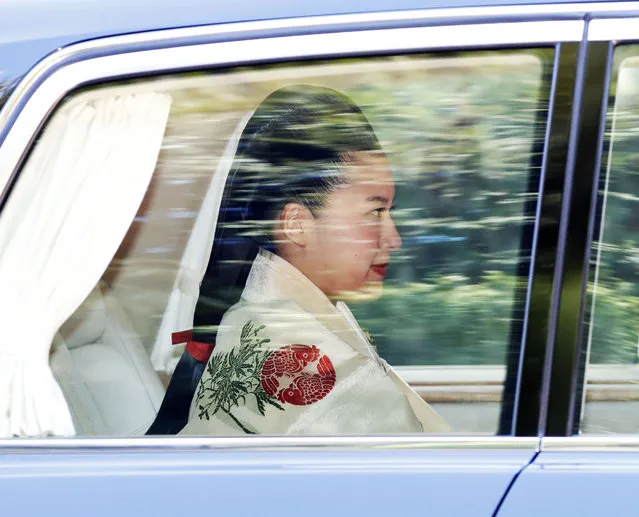 Japanese Princess Ayako, dressed in traditional ceremonial gown, is on her way to her wedding ceremony in Tokyo, Monday, October 29, 2018. (Photo by Kyodo News via AP Photo)