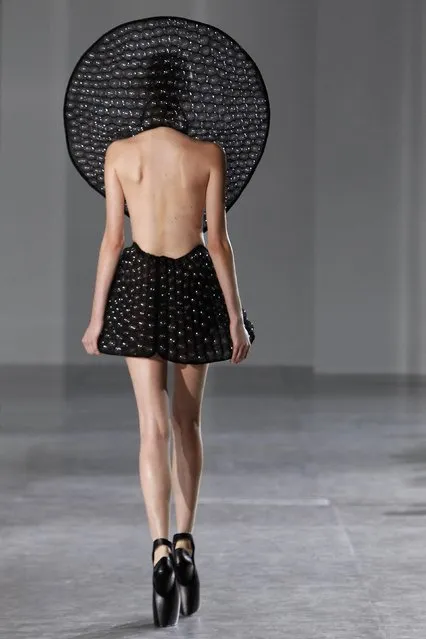 A model wears a creation as part of Iris Van Herpen's ready-to-wear fall/winter 2014-2015 fashion collection presented in Paris, Tuesday, March 4, 2014. (Photo by Thibault Camus/AP Photo)