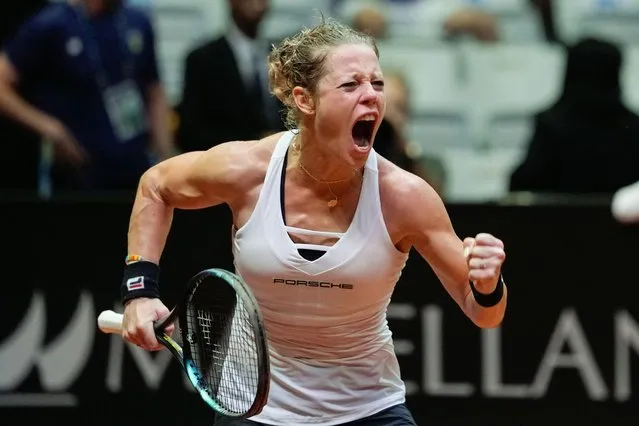 Laura Siegemund of Germany celebrates after defeating Carolina Alves of Brazil during their Billie Jean King Cup tennis match in Sao Paulo, Brazil, Saturday, April 13, 2024. (Photo by Andre Penner/AP Photo)