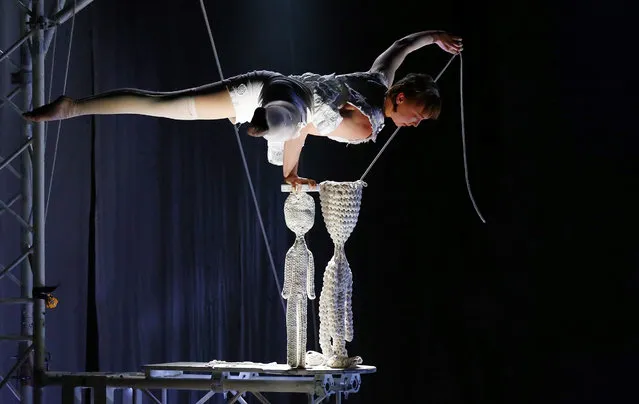 A member of the Swedish circus company Cirkus Cirkor performs during their show “Knitting Peace”, at Las Condes Municipal Theater in Santiago, Chile, 30 June 2015. The circus will be performing in Chile from 01 to 12 July. (Photo by Javier Valdes/EPA)