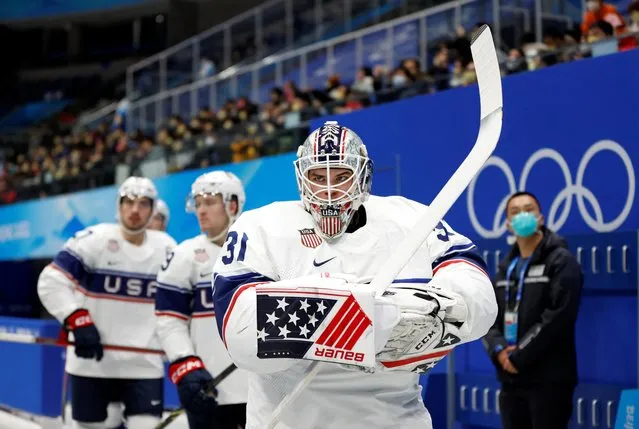 Strauss Mann of the United States and teammates take to the ice before the game against Canada at National Indoor Stadium in Beijing, China on February 12, 2022. (Photo by David W. Cerny/Reuters)
