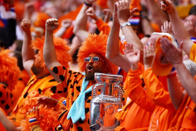Netherlands fans during the Group D match between Poland and the Netherlands at the Euro 2024 soccer tournament in Hamburg, Germany, Sunday, June 16, 2024. (Photo by Kacper Pempel/Reuters)