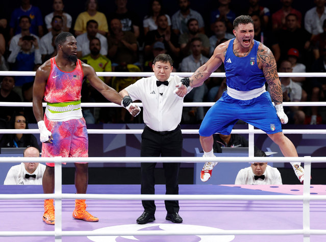 Italy’s Diego Lenzi jumps for joy after defeating Joshua Timothy Edwards of the United States at North Paris Arena in Villepinte, France on July 29, 2024. (Photo by Peter Cziborra/Reuters)