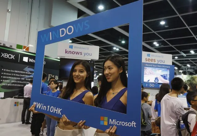 Promotional models pose at the Microsoft Windows 10 booth at Ani-Com & Games Hong Kong in Hong Kong, China July 27, 2015, two days before its global official launch. (Photo by Bobby Yip/Reuters)