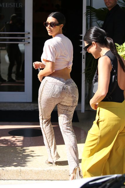 Kim Kardashian shows off her curves in tight pants as she shops with sister Kourtney Kardashian in Miami on December 3, 2019. (Photo by The Mega Agency)