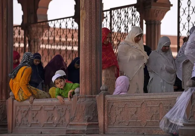 Muslims offer prayers on the last Friday of the holy fasting month of Ramadan at Jama Masjid in New Delhi, India, Friday, April 29, 2022. Islam's holiest month is a period of intense prayer, self-discipline, dawn-to-dusk fasting and nightly feasts. (Photo by Manish Swarup/AP Photo)