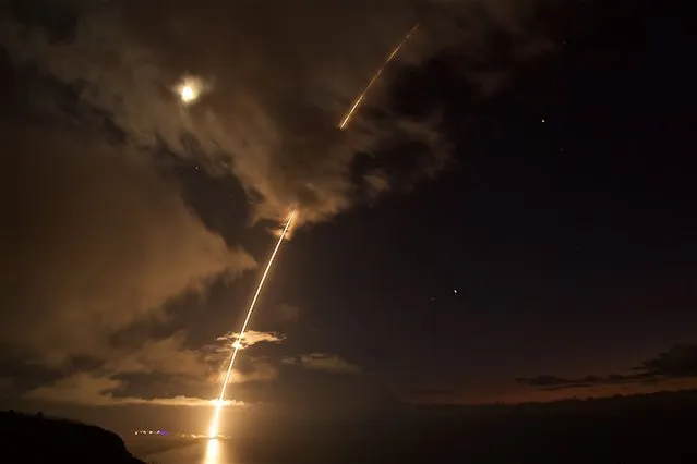A medium-range ballistic missile target is launched from the Pacific Missile Range Facility in Kauai, Hawaii, during Flight Test Standard Missile-27, Event 2 on August 29, 2017. The target was successfully intercepted by SM-6 missiles fired from the guided-missile destroyer USS John Paul Jones (DDG 53). (Photo by U.S. Navy photo by Latonja Martin/Released)