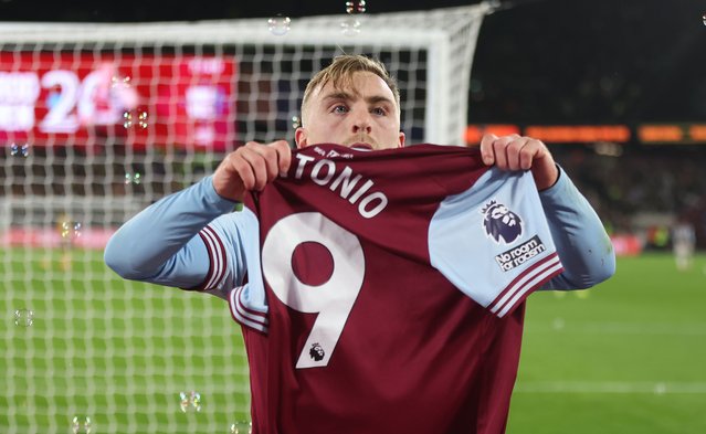 West Ham United's Jarrod Bowen lifts up Michail Antonio's shirt after scoring his side's second goal during the Premier League match between West Ham United FC and Wolverhampton Wanderers FC at London Stadium on December 9, 2024 in London, England. (Photo by Rob Newell – CameraSport via Getty Images)