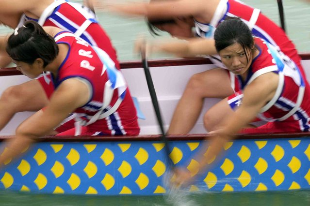 North Korea's team prepare for the Women's Dragon Boat 500m semifinals during the 19th Asian Games at the Wenzhou Dragon Boat Center in Wenzhou, China, Wenzhou, Thursday, October 5, 2023. (Photo by Eugene Hoshiko/AP Photo)