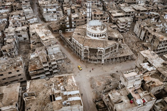 An aerial view of Yarmouk refugee camp, which has been under siege by the forces of the ousted Bashar al-Assad regime for 3 years and subjected to intense attacks in south of Damascus, Syria on December 29, 2024. Citizens are returning to their homes in the war-torn camp. (Photo by Emin Sansar/Anadolu via Getty Images)