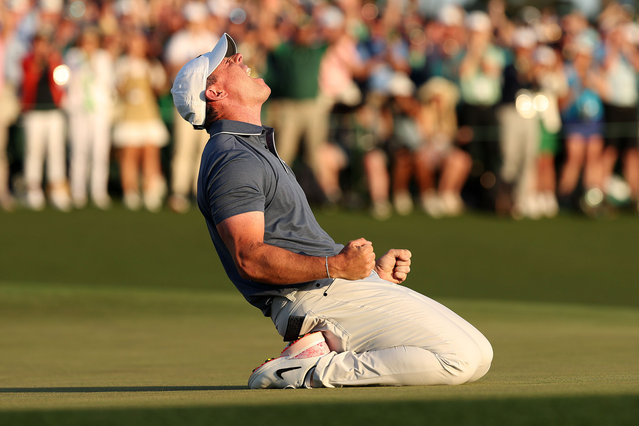 Rory McIlroy of Northern Ireland celebrates winning the 2025 Masters Tournament after the first playoff hole on the 18th green at Augusta National Golf Club on April 13, 2025 in Augusta, Georgia. (Photo by Richard Heathcote/Getty Images)
