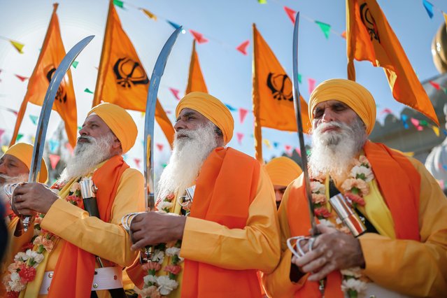 Sikhs take part in the annual procession in Glasgow as part of the Vaisakhi celebration to celebrate the birth of the Sikh Nation on April 06, 2025 in Glasgow, Scotland. Members of Glasgow's Sikh community celebrate this Sikh harvest festival originating in Punjab, northern India. It was chosen by Guru Gobind Singh in 1699 as the moment to establish the Khalsa, the collective name for baptised Sikhs. (Photo by Jeff J. Mitchell/Getty Images)