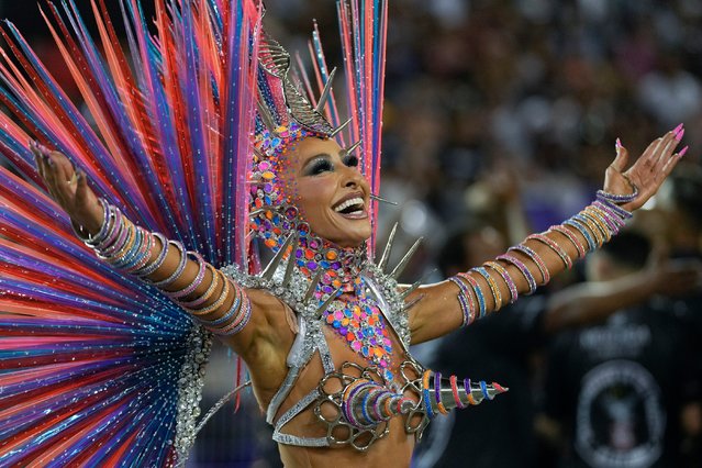 Brazilian model and TV presenter Sabrina Sato from the Gavioes da Fiel samba school performs during a Carnival parade in Sao Paulo, Brazil, Sunday, February 11, 2024. (Photo by Andre Penner/AP Photo)