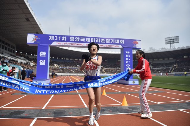 A participant takes part in the 31st Pyongyang International Marathon at Kim Il Sung Stadium in Pyongyang on April 6, 2025, as part of celebrations marking the birth of North Korea's founding leader Kim Il Sung in 1912. (Photo by Kim Won Jin/AFP Photo)