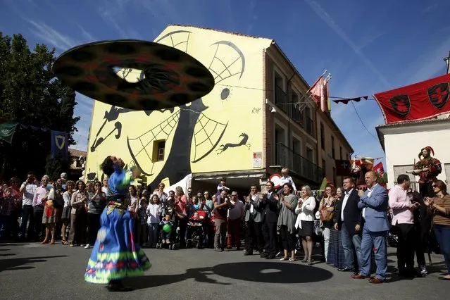 A Sufi dancer performs during the annual Cervantes market (Mercado Cervantino) in the hometown of famous Spanish writer Miguel de Cervantes, Alcala de Henares, Spain, October 9, 2015. (Photo by Susana Vera/Reuters)