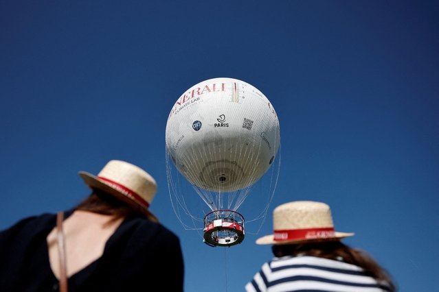 The Ballon Generali de Paris hot air research balloon performs air quality checks in the sky to make the progress of global warming visible, over the Park Andre-Citroen in Paris, France, on April 29, 2025. (Photo by Benoit Tessier/Reuters)