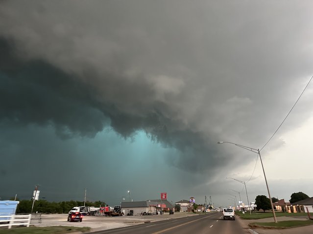 A view of mesocyclone and green glow from very large hail as a tornadic high precipitation supercell arrives in Hennessey, Oklahoma, United States on May 07, 2024. (Photo by Matt Phelps, Tempest Tours/Anadolu via Getty Images)