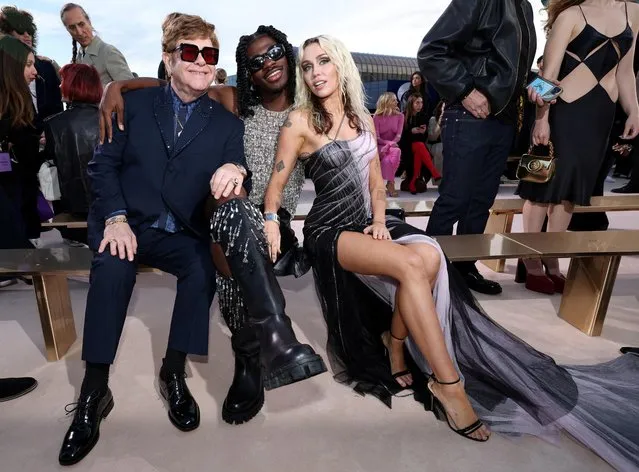 British singer Elton John, American rapper Lil Nas X and American singer-songwriter Miley Cyrus attend the Versace Fall-Winter 2023 collection fashion show in Los Angeles, California, U.S. March 9, 2023. (Photo by Mario Anzuoni/Reuters)