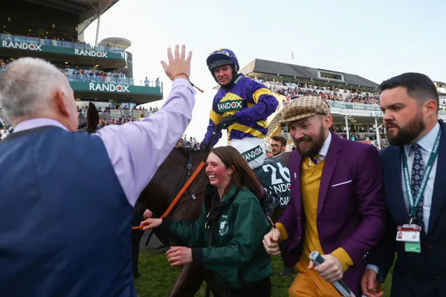 Derek Fox riding Corach Rambler celebrates winning the Randox Grand National Chase during day three of the Randox Grand National Festival at Aintree Racecourse on April 15, 2023 in Liverpool, England. (Photo by Michael Steele/Getty Images)