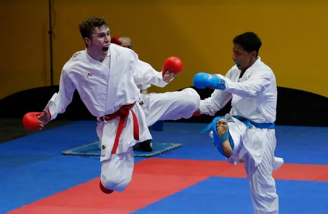 Russia's Danila Mikhailichenko goes head to head with Nicaragua's Kevin Cruz in Karate at the ALBA Games in Venezuela on April 28, 2023. (Photo by Leonardo Fernandez Viloria/The Times)