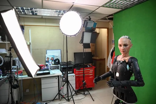 This photo taken on May 10, 2023 shows the latest version of a robot called Sophia being tested at Hanson Robotics, a robotics and artificial intelligence company which creates human-like robots, in Hong Kong. (Photo by Peter Parks/AFP Photo)