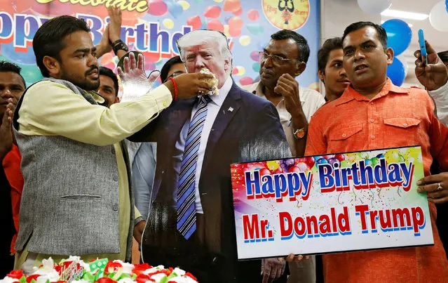 Members of Hindu Sena, a right wing Hindu group, celebrate U.S. President Donald Trump's birthday in New Delhi, India June 14, 2018. (Photo by Saumya Khandelwal/Reuters)