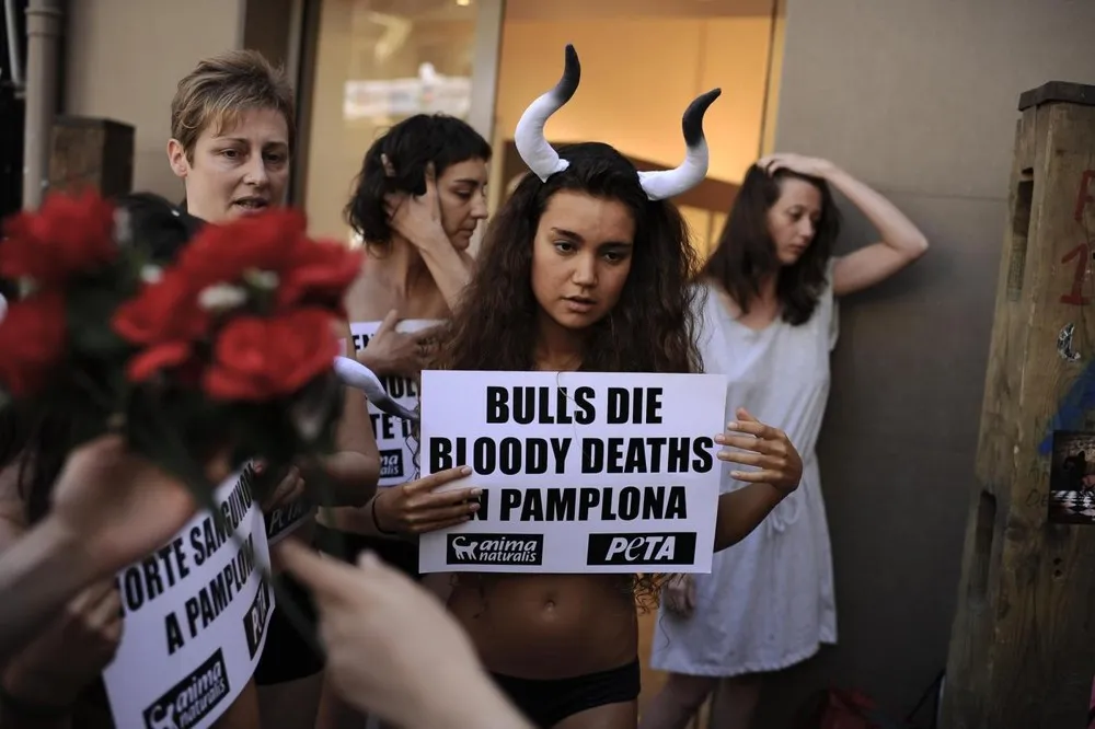 Naked “Corpses” Bare the Bloody Cruelty of Bullfighting in Pamplona