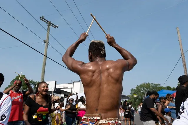 Adrian “Flexx” Couch hypes the crowd up during a block party to mark Juneteenth, which commemorates the end of slavery in Texas, over two years after the 1863 Emancipation Proclamation freed slaves elsewhere in the U.S., in Nashville, Tennessee, U.S., June 17, 2023. (Photo by Kevin Wurm/Reuters)