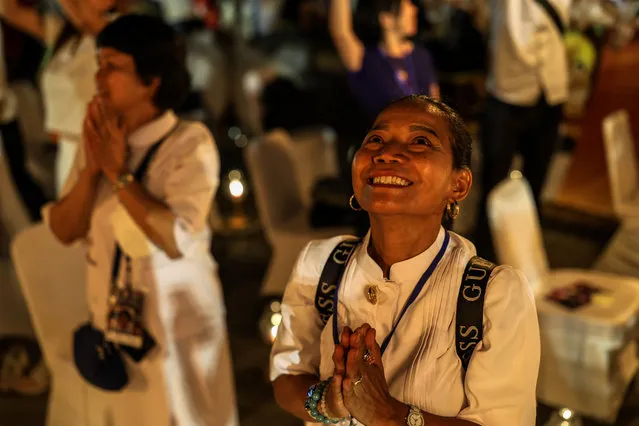 Buddhist devotees release lanterns at the Borobudur temple as a part of celebrations for Vesak Day on June 4, 2023, in Magelang, Indonesia. Buddhists in Indonesia celebrated Vesak Day on Sunday to honour the birth, enlightenment, and death of Buddha more than 2,000 years ago. (Photo by Garry Lotulung/NurPhoto via Getty Images)