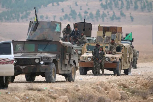 Fighters from the Democratic Forces of Syria sit on their military vehicles during what they said was an offensive against Islamic State militants to take control of Tishrin dam, south of Kobani, Syria December 26, 2015. A U.S.-backed alliance of Syrian Kurds and Arab rebel groups, supported by U.S. coalition planes, captured the dam on Saturday from Islamic State, cutting one of its main supply routes across the Euphrates, an alliance spokesman said. (Photo by Rodi Said/Reuters)