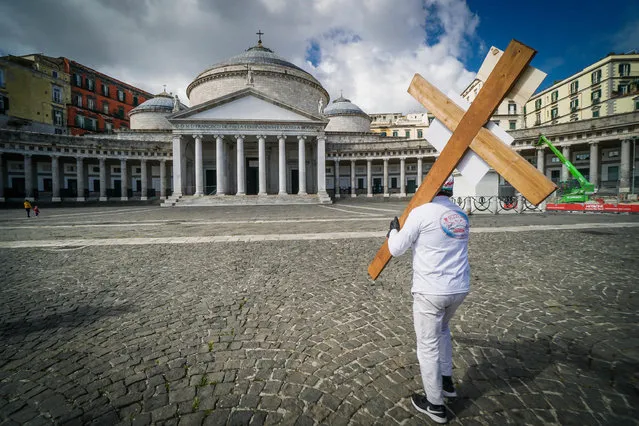 A merchant belonging to a trade association protests against the restrictions decided by the Italian Government to counter the Covid-19 pandemic, in Plebiscito square, Naples, Italy, 07 April 2021. (Photo by Cesare Abbate/EPA/EFE)
