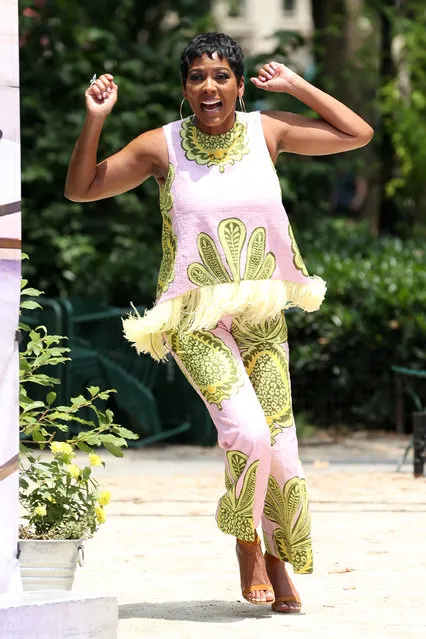American broadcast journalist and television talk show host Tamron Hall films a new mystery show in Madison Square Park wearing a green frilly top and pants in New York City in the second decade of July 2023. (Photo by Christopher Peterson/Splash News and Pictures)