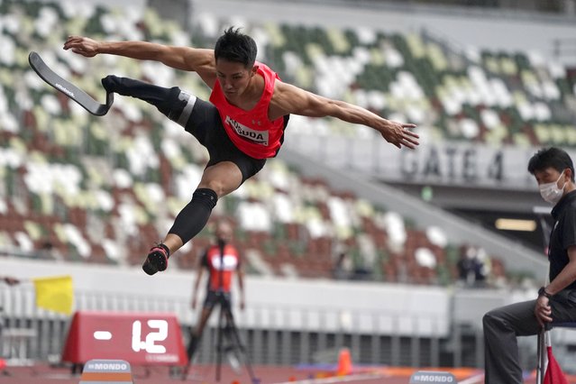 Japanese Junta Kosuda competes in the men's long jump during an athletics test event for the Tokyo 2020 Paralympics Games at National Stadium in Tokyo, Tuesday, May 11, 2021. (Photo by Shuji Kajiyama/AP Photo)