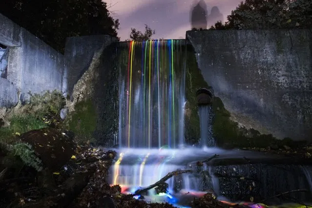 “Neon Luminance” glowstick waterfall photography, California, America. (Photo by Sean Lenz/Kristoffer Abildgaard)