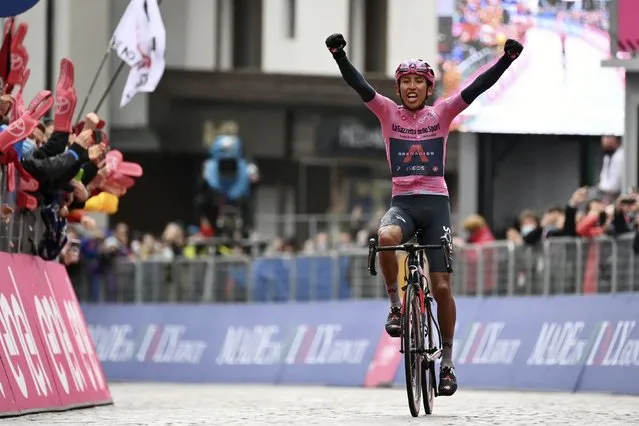 Colombia's Egan Bernal celebrates as he crosses the finish line to win the 16th stage of the Giro d'Italia cycling race, from Sacile to Cortina D'Ampezzo, northern Italy, Monday, May 24, 2021. (Photo by Massimo Paolone/LaPresse via AP Photo)