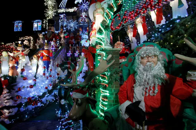 A decorated house is seen at the Dyker Heights Christmas Lights in the Dyker Heights neighborhood of Brooklyn, New York City, U.S., December 23, 2016. (Photo by Andrew Kelly/Reuters)