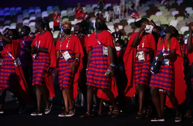 Members of Kenya's delegation parade during the opening ceremony of the Tokyo 2020 Olympic Games, at the Olympic Stadium, in Tokyo, on July 23, 2021. (Photo by Hannah Mckay/Reuters)
