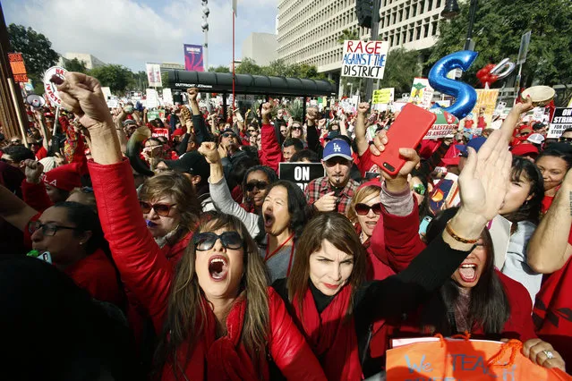 Educators rally as a strike against the Los Angeles Unified School District entered its fifth day outside City Hall in Los Angeles Friday, January 18, 2019. Clashes over pay, class sizes and support-staff levels in the district led to its first strike in 30 years and prompted the staffing of classrooms with substitute teachers and administrators. (Photo by Damian Dovarganes/AP Photo)