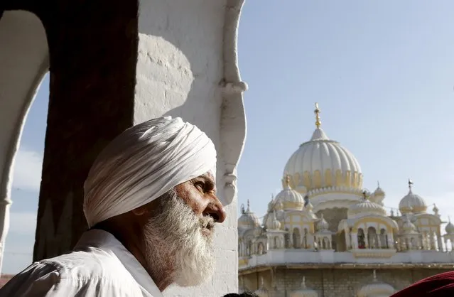 A Sikh devotees watches the Baisakhi festival at Panja Sahib shrine in Hassan Abdel April 13, 2015. (Photo by Caren Firouz/Reuters)